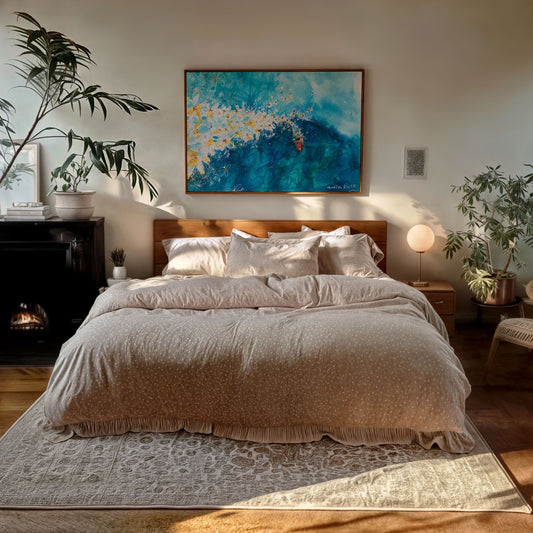 Bloomin' Left watercolour surf art print by Rebekah Steen in a brown frame above a bed