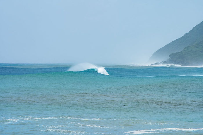 Offshore A-frame wave in Japan, photographed by Christian Jones.
