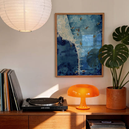 Above The Set watercolour surf art print by Rebekah Steen displayed in a living room