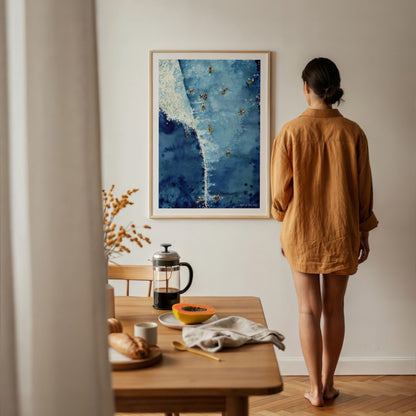 Above The Set watercolour surf art print by Rebekah Steen displayed in an office