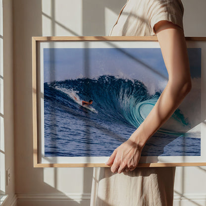 Almond Tubes surf photography print by John Seaton Callahan with a white border, being carried in a natural wood frame