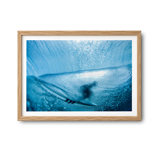 Aqua Cocoon surf photography print by Sean Davey in a natural wood frame