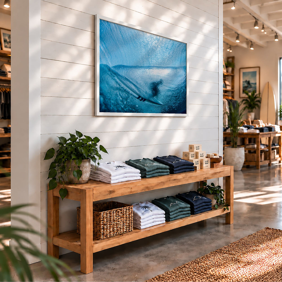 Aqua Cocoon surf photography print by Sean Davey framed on the wall of a surf shop