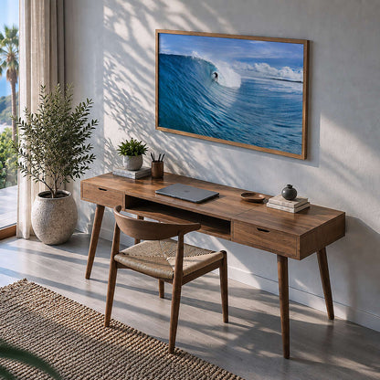 Blue Sling surf photography print by Sean Davey framed above a desk in a home office