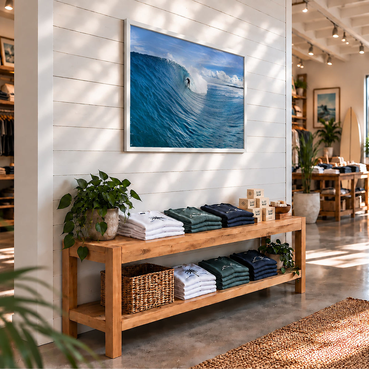 Blue Sling surf photography print by Sean Davey framed on the wall of a surf shop