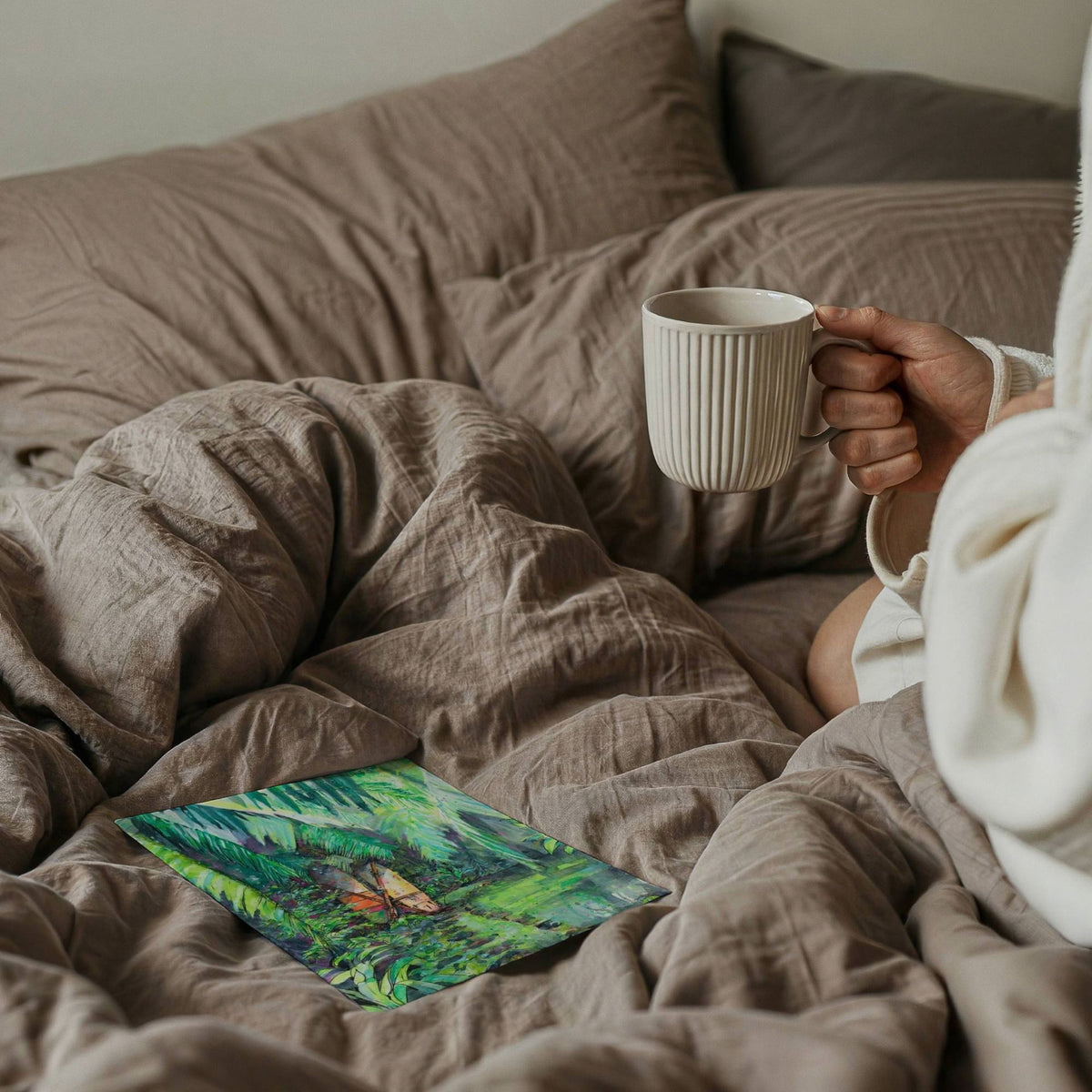 Clandestino Gem watercolour surf art print by Rebekah Steen displayed by a bed