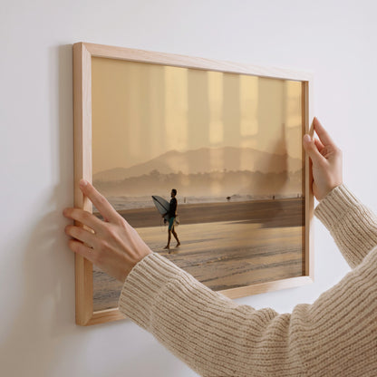 Praia da Vila, Brazil sunset surf photography print by Douglas Schneiders framed and hanging on a wall