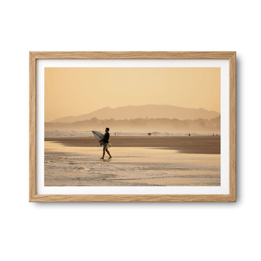 Praia da Vila, Brazil sunset surf photography print by Douglas Schneiders in a wooden frame