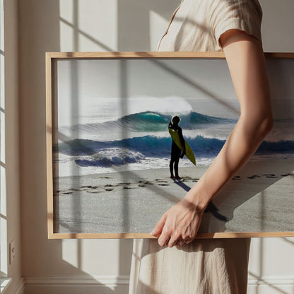 Framed Heaven on a Stick surf photography print by Sean Davey carried under an arm