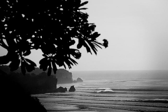 Surfing in Bali, Indonesia, photographed by Jason Childs