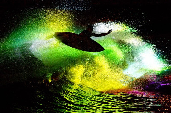 Night surfing under lights at the Hurley wave pool, photographed by Jason Childs