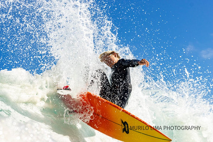 George Messiter throwing spray off the top, photographed by Murilo Lima