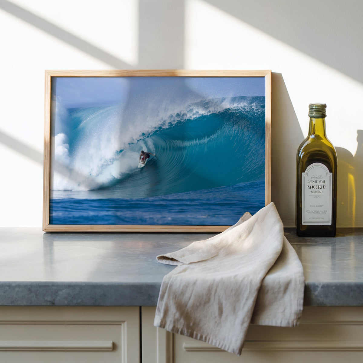 Perfection surf photography print by Sean Davey framed on a kitchen worktop