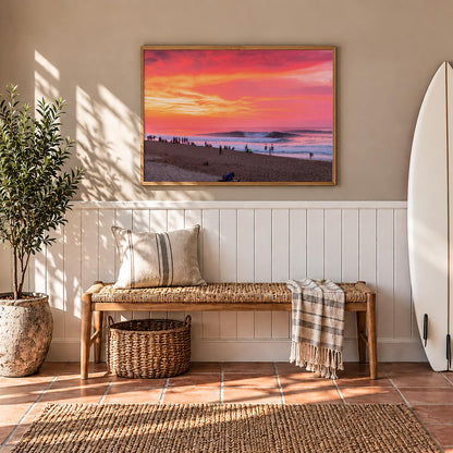 Pipeadelic surf photography print by Sean Davey framed in a hallway above a bench, beside a surfboard