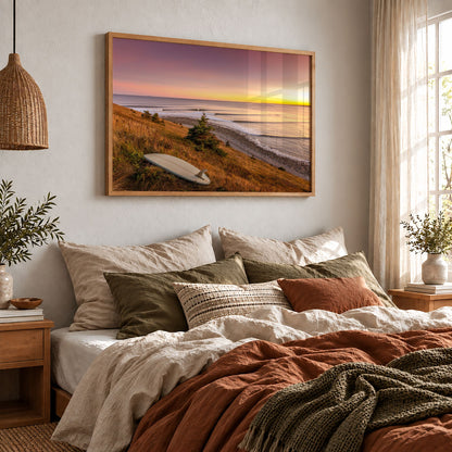 Rolling Lines surf photography print by Adam Cornick framed above a bed