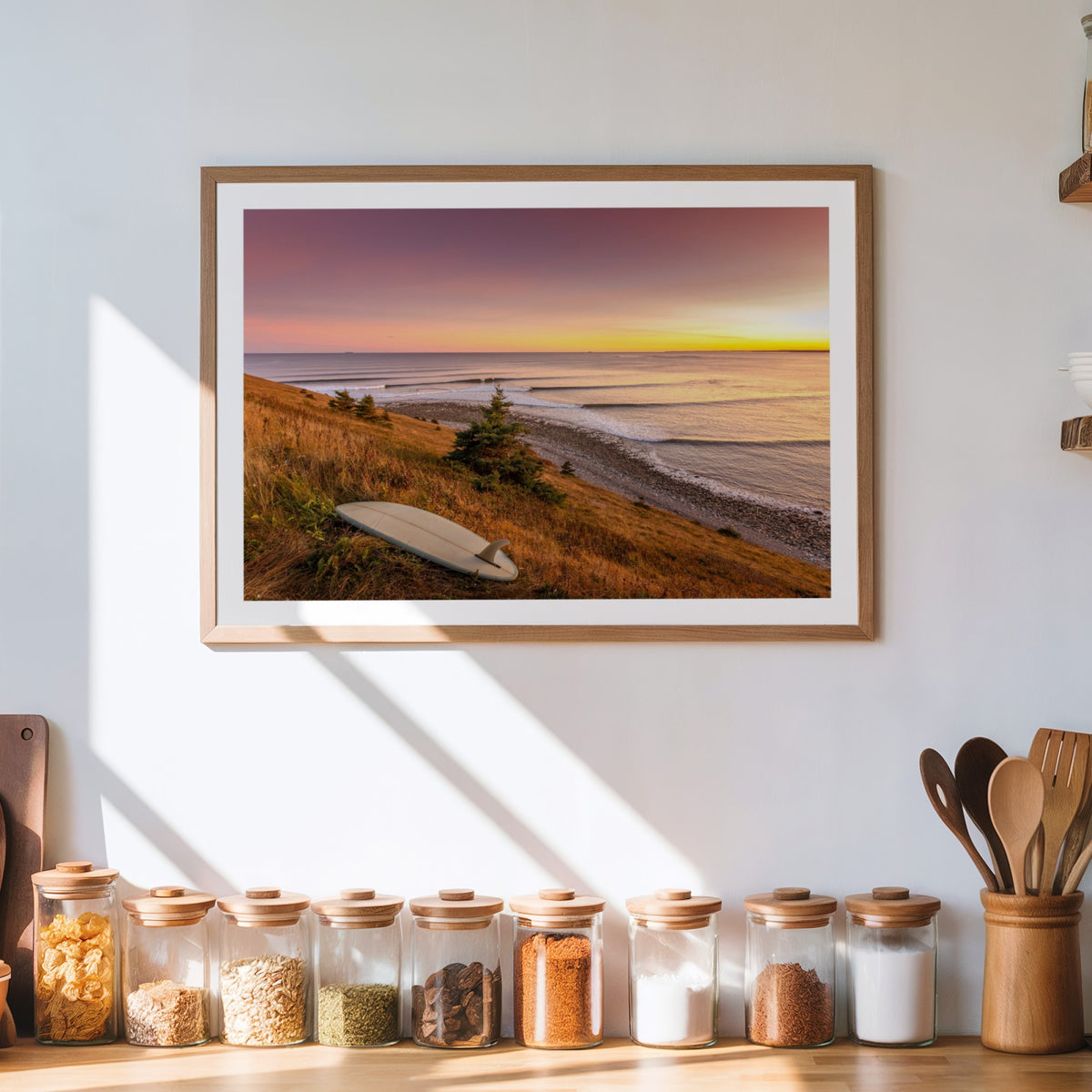 Rolling Lines surf photography print by Adam Cornick framed above a kitchen counter