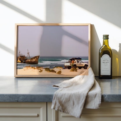 Shipwrecks surf photography print by John Seaton Callahan framed and leaning on a kitchen counter
