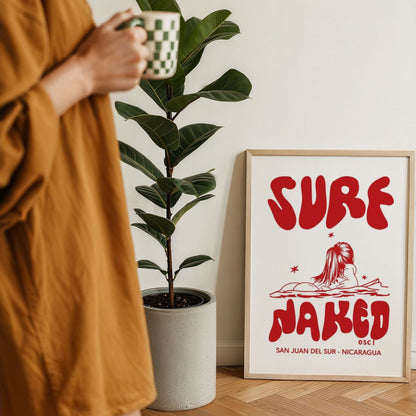 Surf Naked surf illustration print by Osci displayed beside a coffee