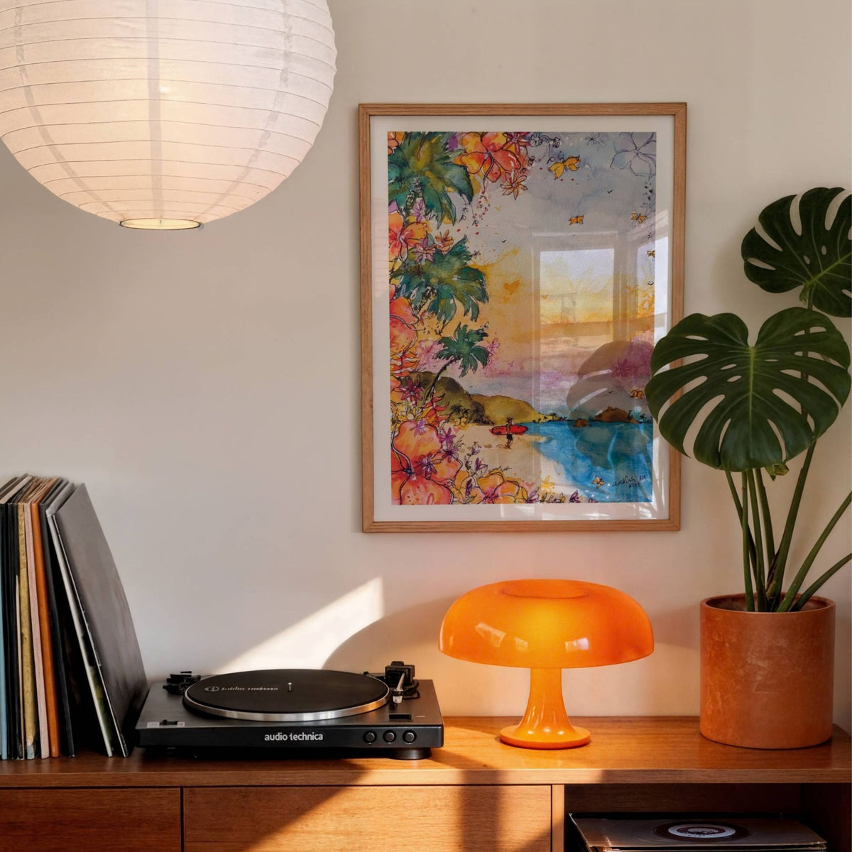 The Red Board watercolour surf art print by Rebekah Steen displayed in a retro-style room