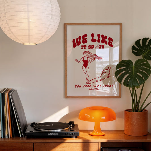 We Like It Spicy surf illustration print by Osci displayed in a retro-style room